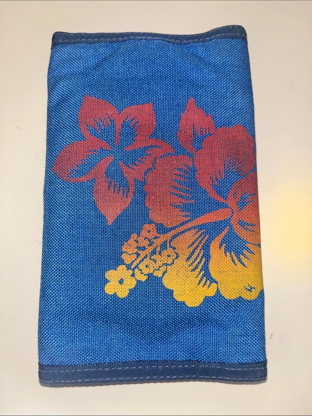 Rainbow Blue Floral Wallet with Red and Yellow Accents